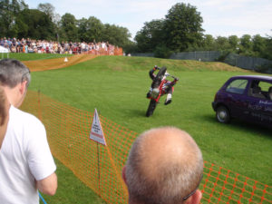 Dougie Lampkin Rides his bike over our tanks