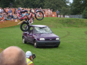 Dougie Lampkin Rides his bike over our tanks