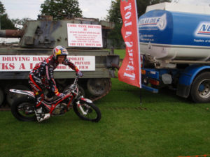 Dougie Lampkin Rides his bike over our tanks