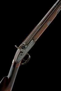 SIGNED JOHN WIGGAN, A 12-BORE PERCUSSION SINGLE-BARRELLED SHOTGUN