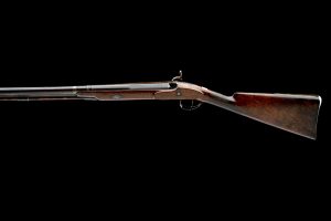 SIGNED JOHN WIGGAN, A 12-BORE PERCUSSION SINGLE-BARRELLED SHOTGUN